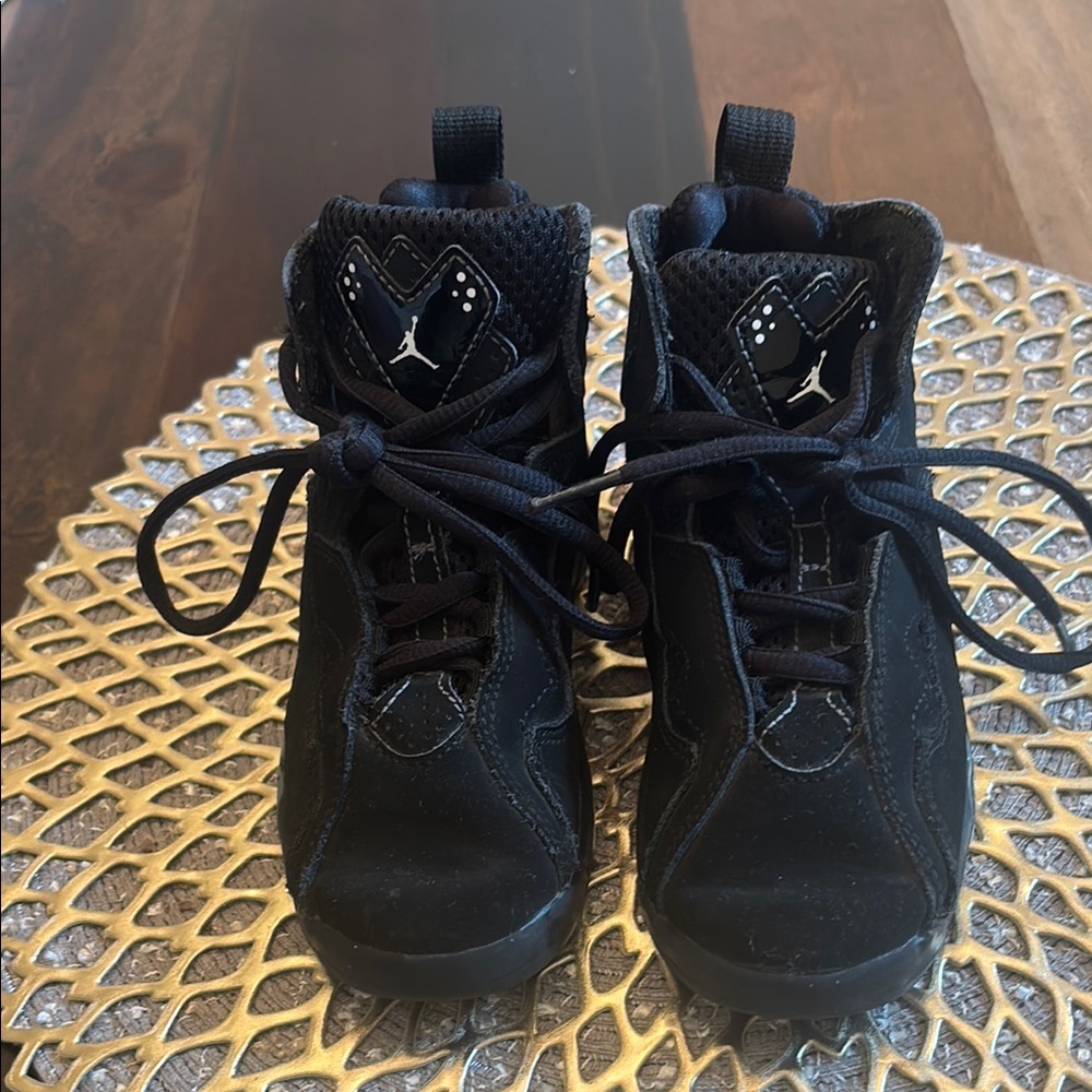 Nike Kids  Jordan’s Black Sneakers.